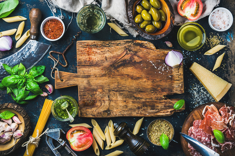 Italian food ingredients on rustic wooden board
