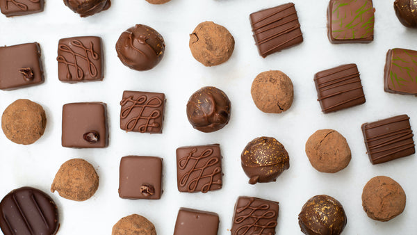 chocolate pralines on a white background