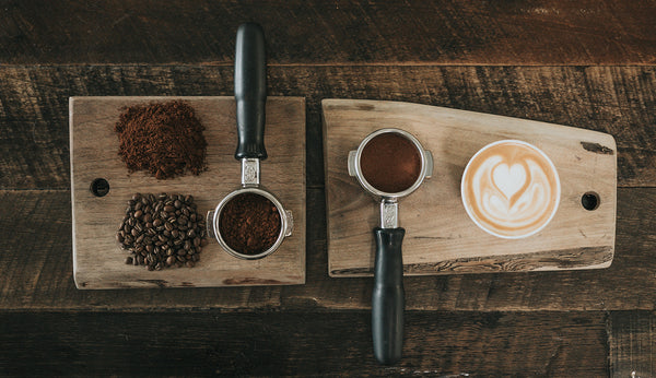 coffee beans, roaster and cup of latte