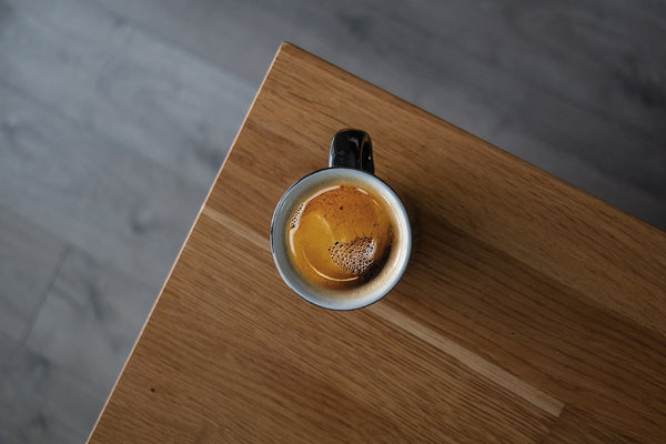 a cup of coffee on a table