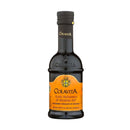 A bottle of Colavita Balsamic Vinegar of Modena IGP showing the front label and brand name.
