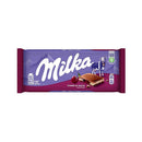 A packaged bar of Milka Milk Chocolate with Cherry Cream, showing the brand logo and an image of the chocolate.