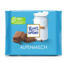 A packaged bar of Ritter Sport 30% Alpine Milk Chocolate showing the brand's logo, chocolate pieces and a milk can.