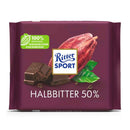 A packaged bar of Ritter Sport 50% Dark Chocolate, showing the brand's logo, chocolate pieces and a cocoa pod.