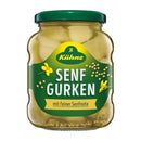 A jar of Kuhne Mustard Pickles Senfgurken, showing the pickles through the glass and the brand label.